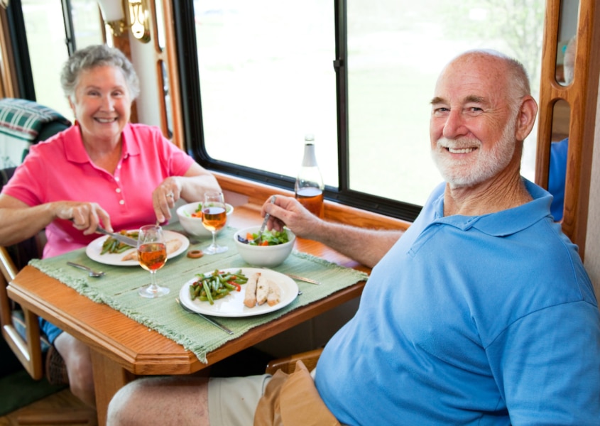 Seniors enjoying a meal after hospital discharge