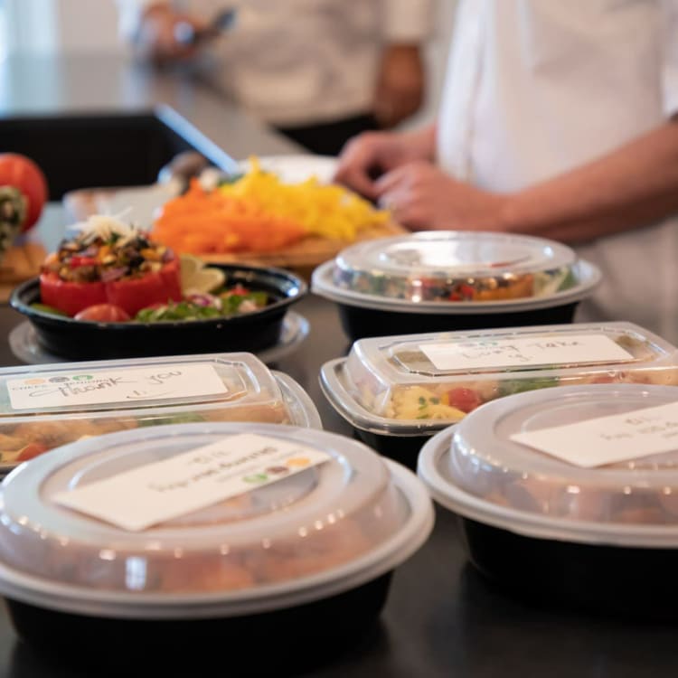Healthy customized meal prepped for the week in reusable containers.