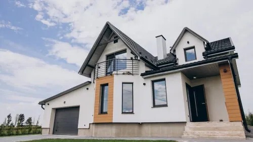 modern, white-walled two-story house